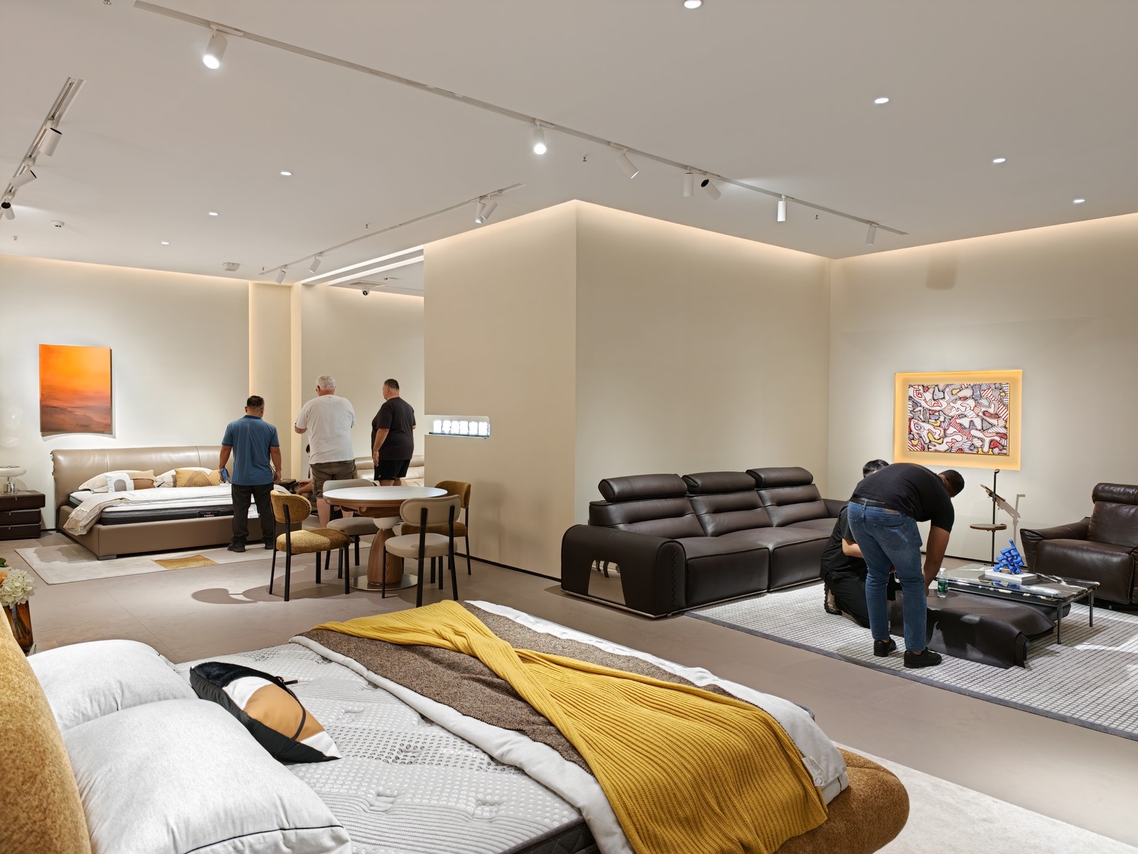 International wholesale buyers inspecting sofas in ATTICO CASA Foshan showroom